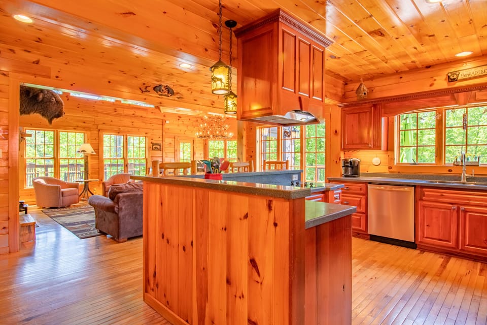 Main level: dining room, kitchen, and living room perfect for entertaining