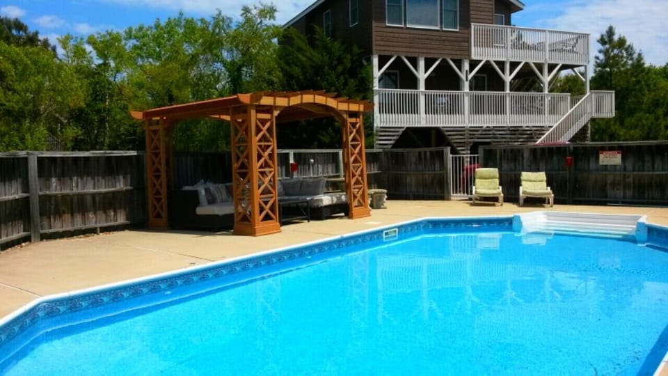 Renovated pool with new pergola and comfortable seating