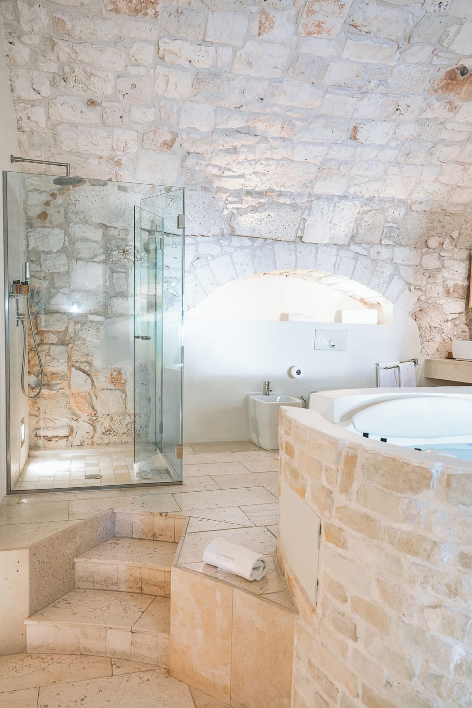 Suite Master | Bathroom | Designer toiletries, hair dryer, bathrobes, slippers