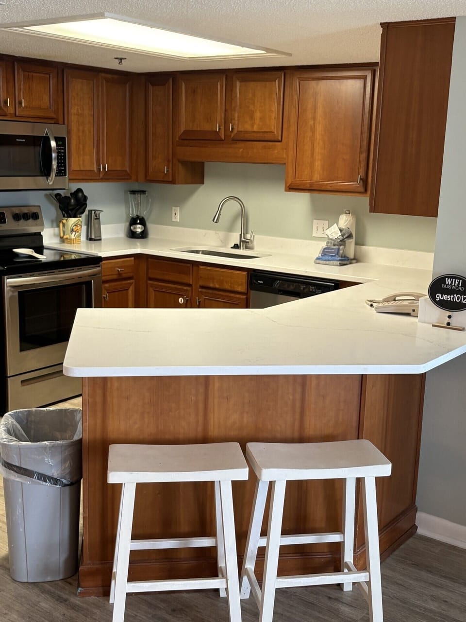 New quartz countertops and new sink and new kitchen faucet