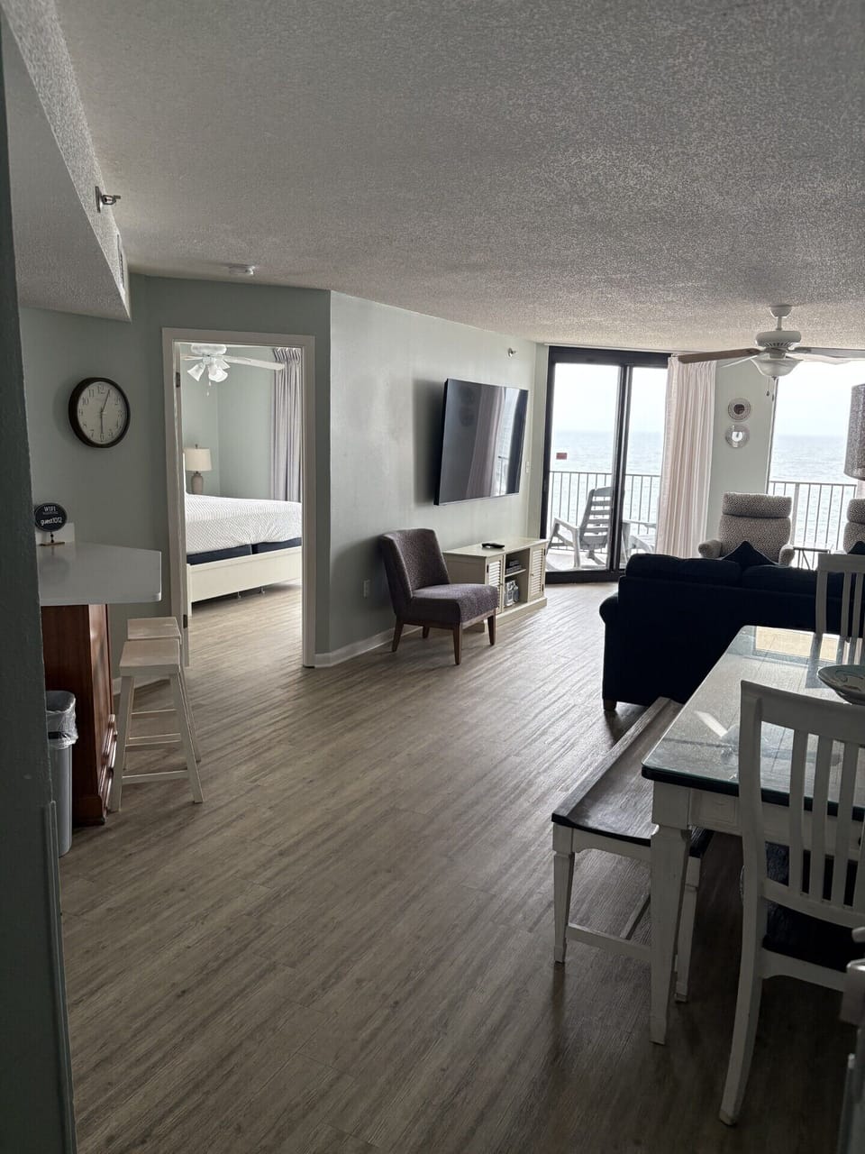 From dining area to LR and looking into the Master BR & out to the balcony