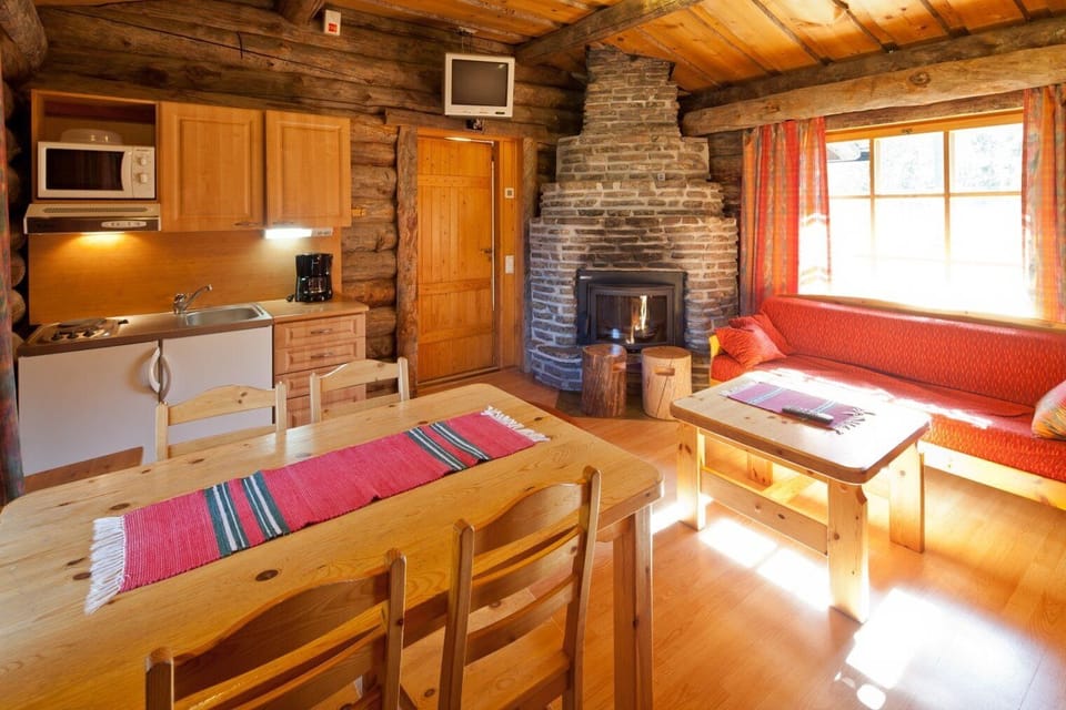 Cabin, Fireplace | Private kitchen | Fridge, electric kettle