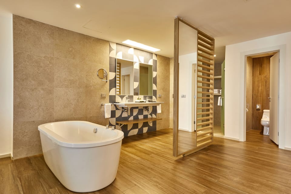Separate tub and shower, eco-friendly toiletries, hair dryer, bathrobes