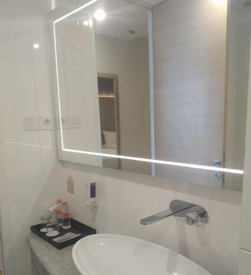 Shower, free toiletries, hair dryer, slippers