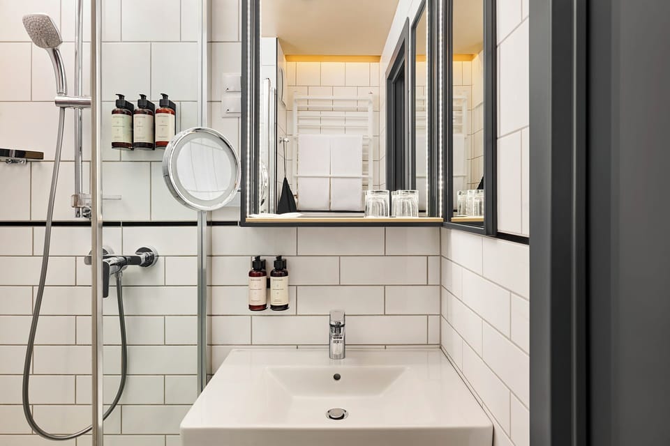 Shower, free toiletries, hair dryer, towels