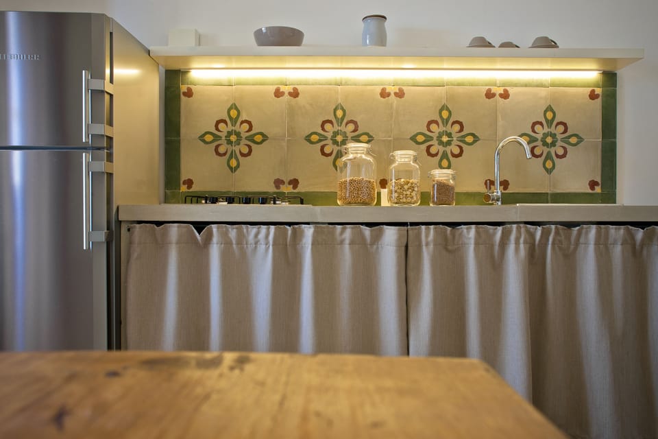 Standard Apartment | Private kitchen | Fridge, cleaning supplies