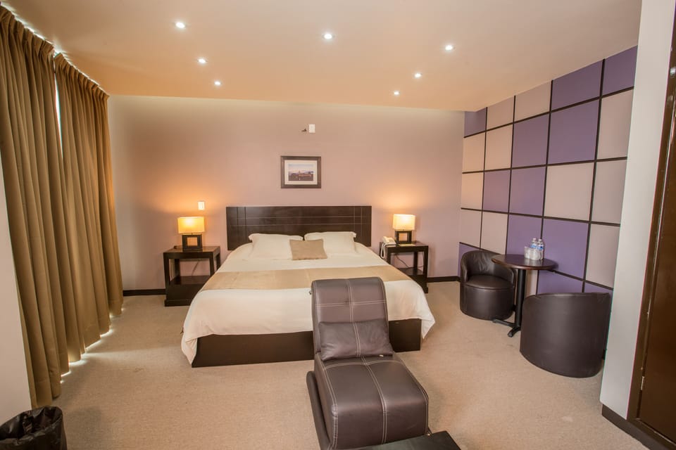 Junior Suite, 1 Bedroom | In-room safe, desk, iron/ironing board, WiFi (free)