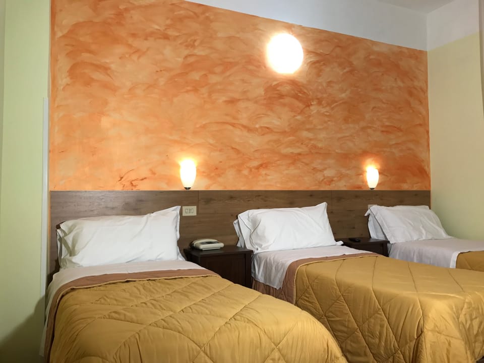 Triple Room | Iron/ironing board, cribs/infant beds, free WiFi, bed sheets