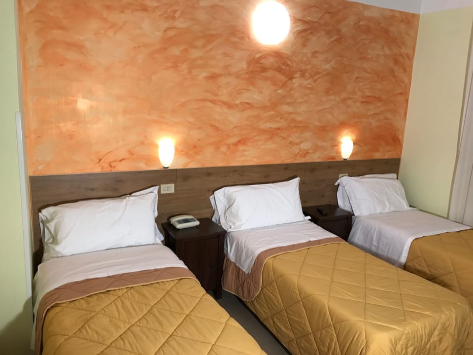 Triple Room | Iron/ironing board, cribs/infant beds, free WiFi, bed sheets