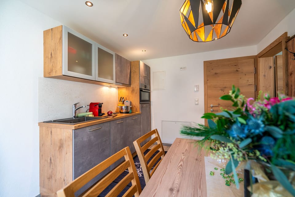 Apartment (Rofan) | Private kitchen | Full-size fridge, microwave, oven, stovetop