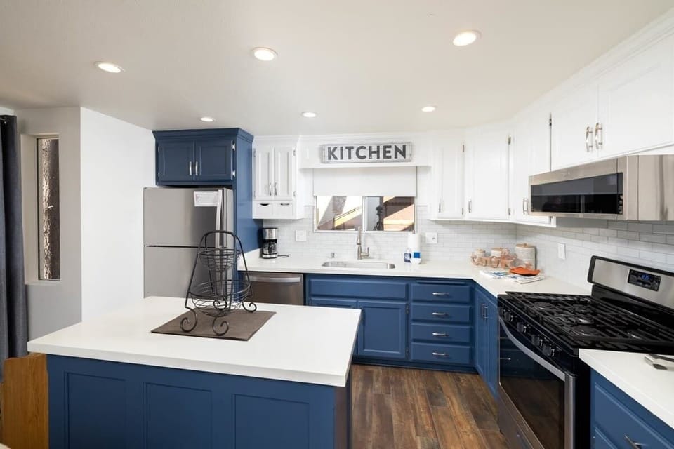 Fully equipped new modern kitchen with open concept dining.