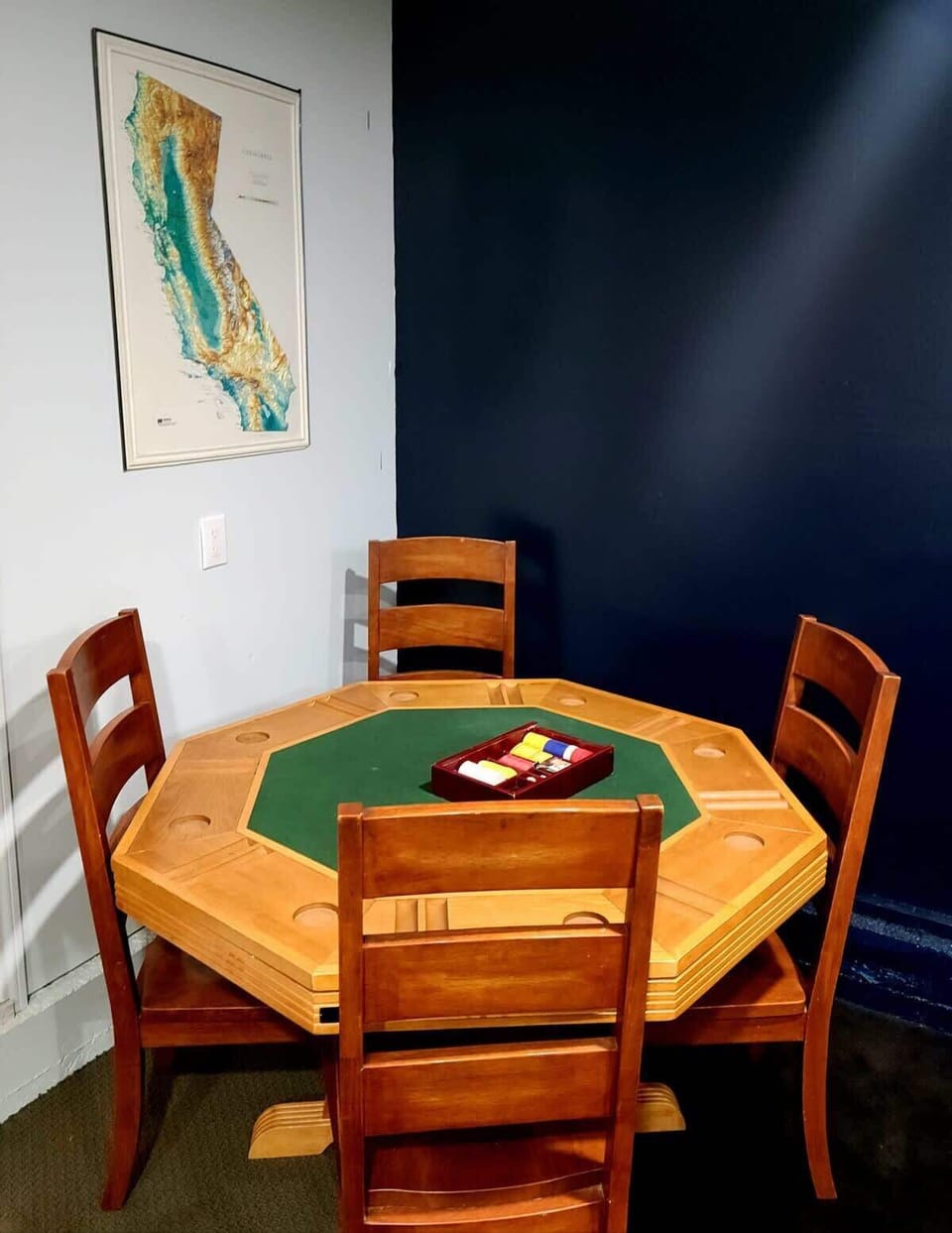 Poker table in game room.