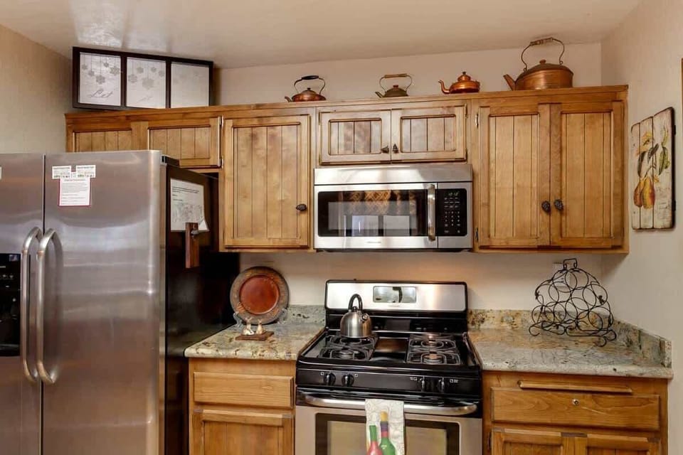 Modern appliances and new designer cabinets make being in the kitchen fun.