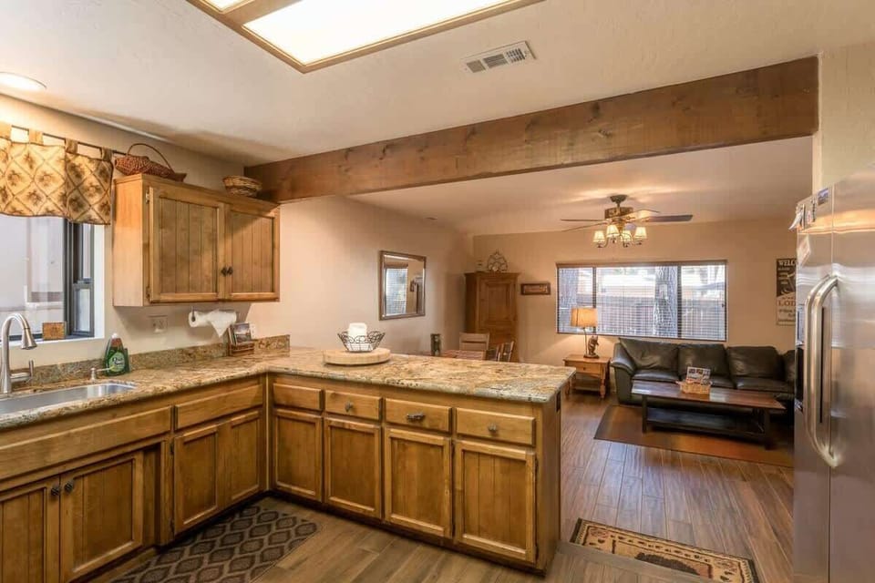 Modern Kitchen opens to Living area and dining area so no one misses out