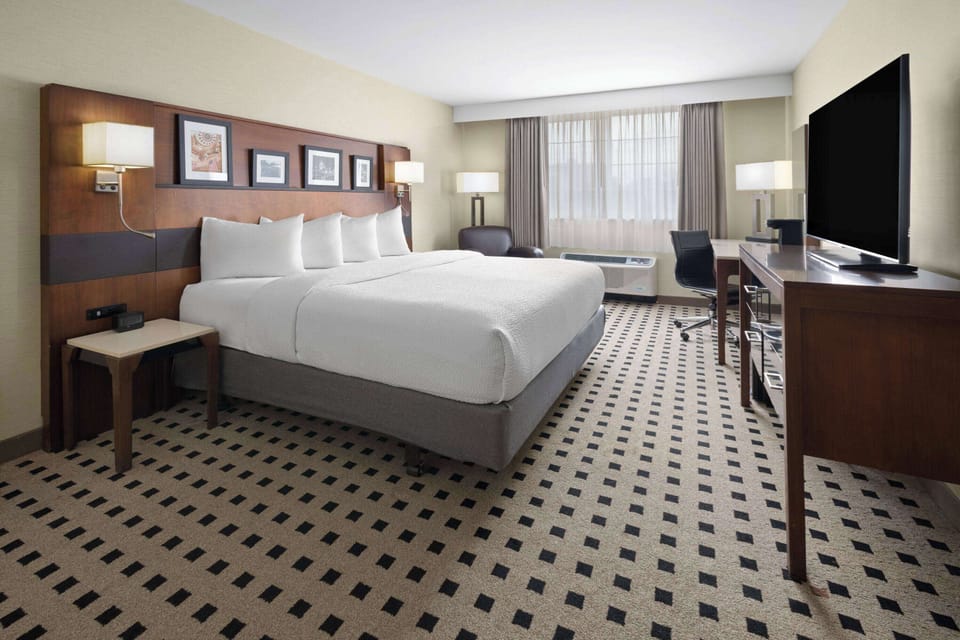 Premium bedding, Select Comfort beds, desk, laptop workspace