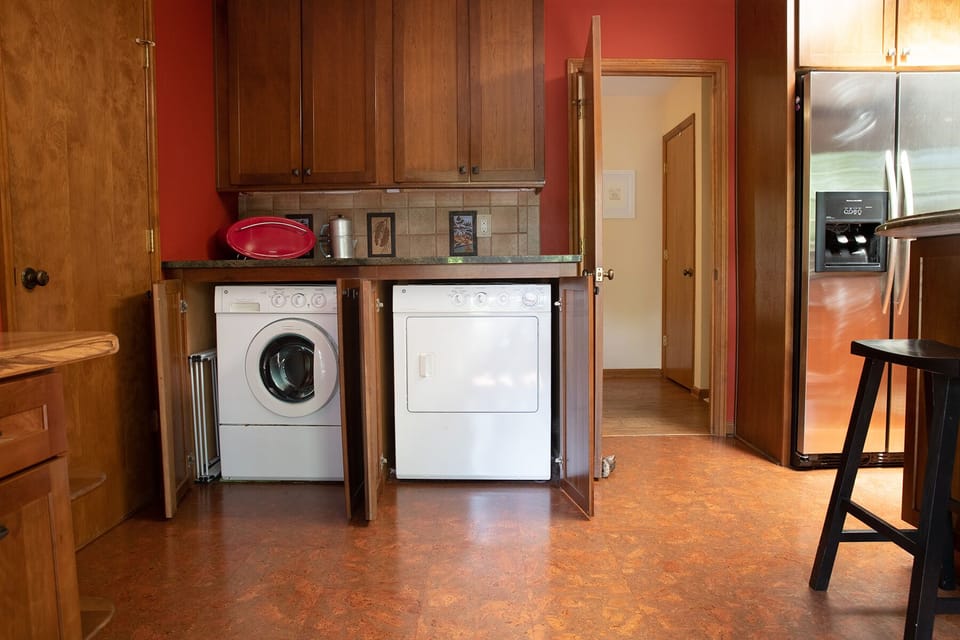 Washer and Dryer, help yourself. There is also an iron and ironing board