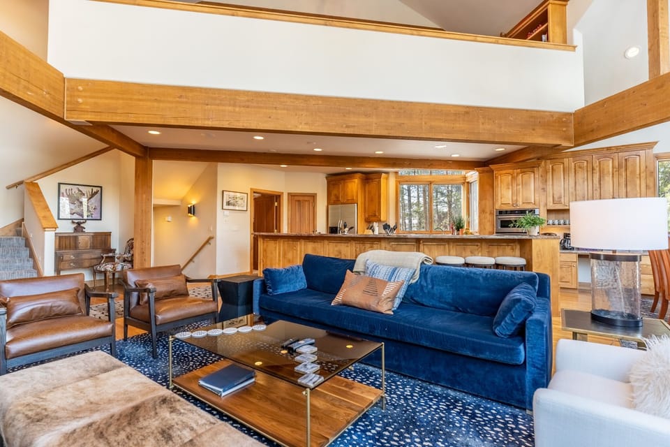 Updated living area offering scenic views and a fireplace.