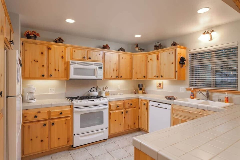 Country Kitchen with all appliances and Kitchenware.