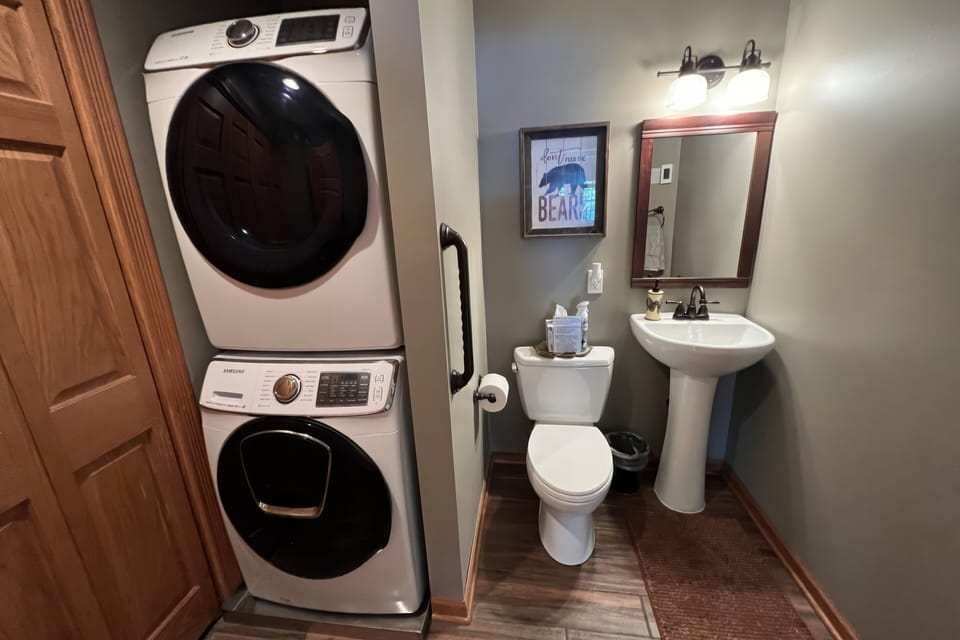 Main level laundry room and 1/2 bath
