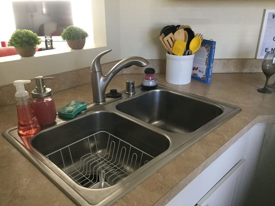 Kitchen is fully equipped with all the little things. 
