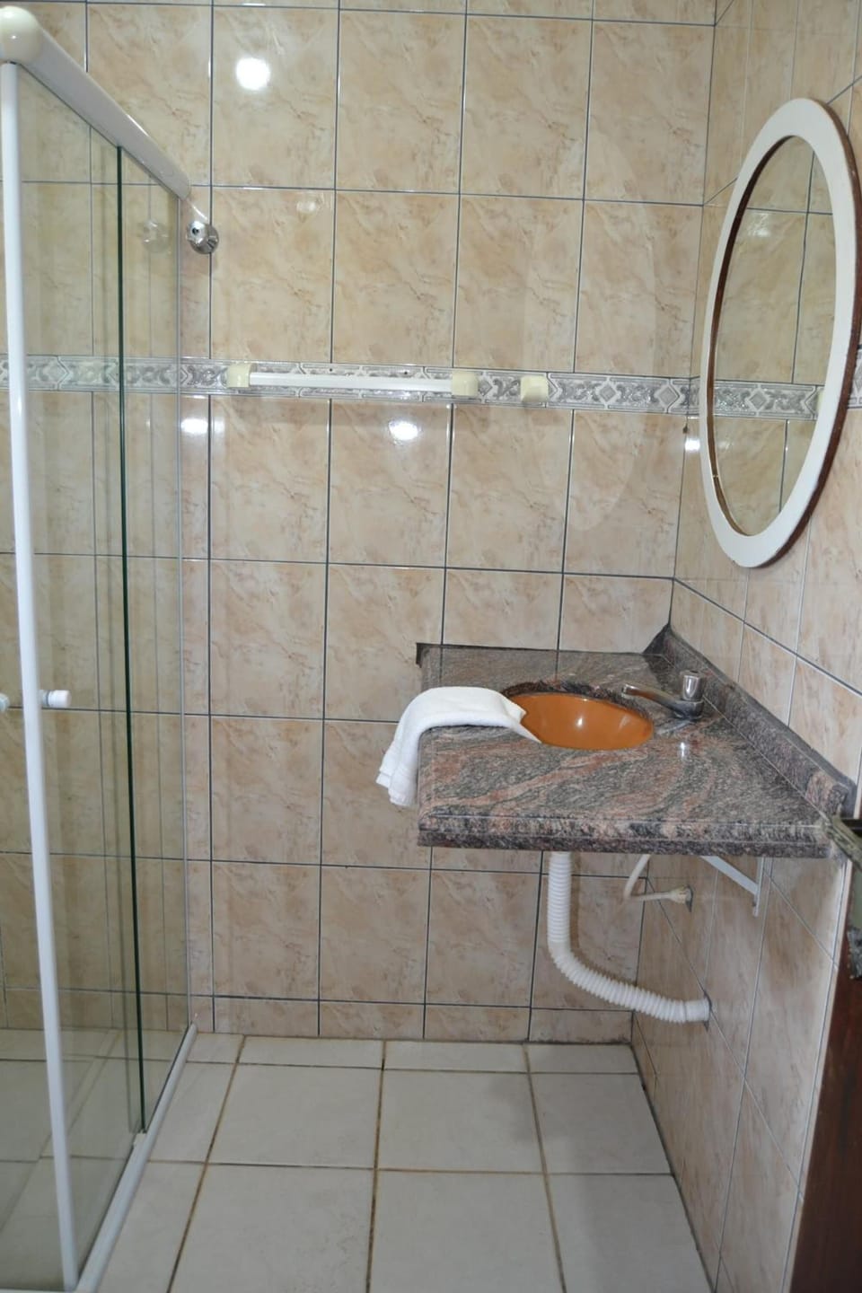 Shower, rainfall showerhead, towels