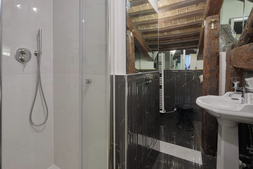 Double Room (Cozy) | Bathroom | Shower, free toiletries, hair dryer, towels