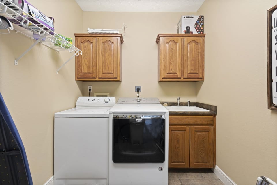 Main level pantry with washer and dryer