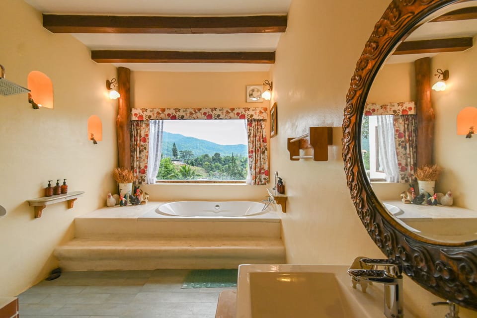 Junior Suite | Bathroom | Separate tub and shower, deep soaking tub, free toiletries, hair dryer
