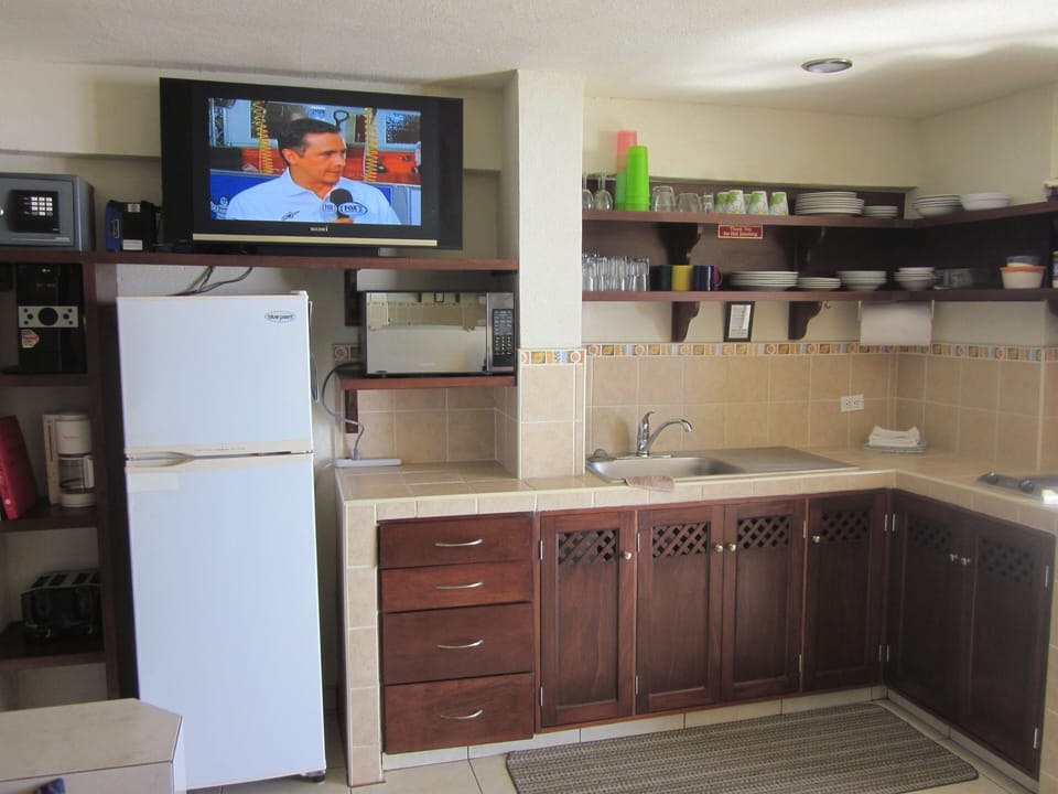 Full kitchen, full size fridge, blender, electric skillet, microwave, pots & pan