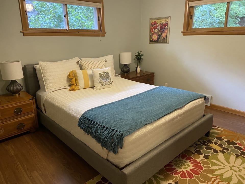 Back bedroom. Queen sized bed with large walkin closet.