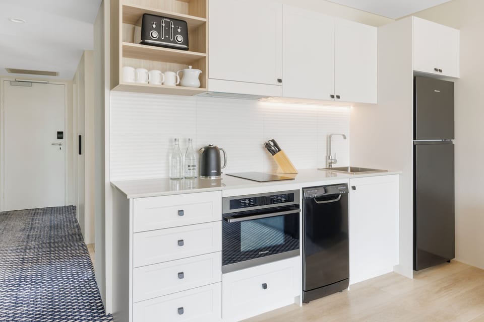 Apartment, 1 Bedroom | Living area | 43-inch flat-screen TV with cable channels, TV