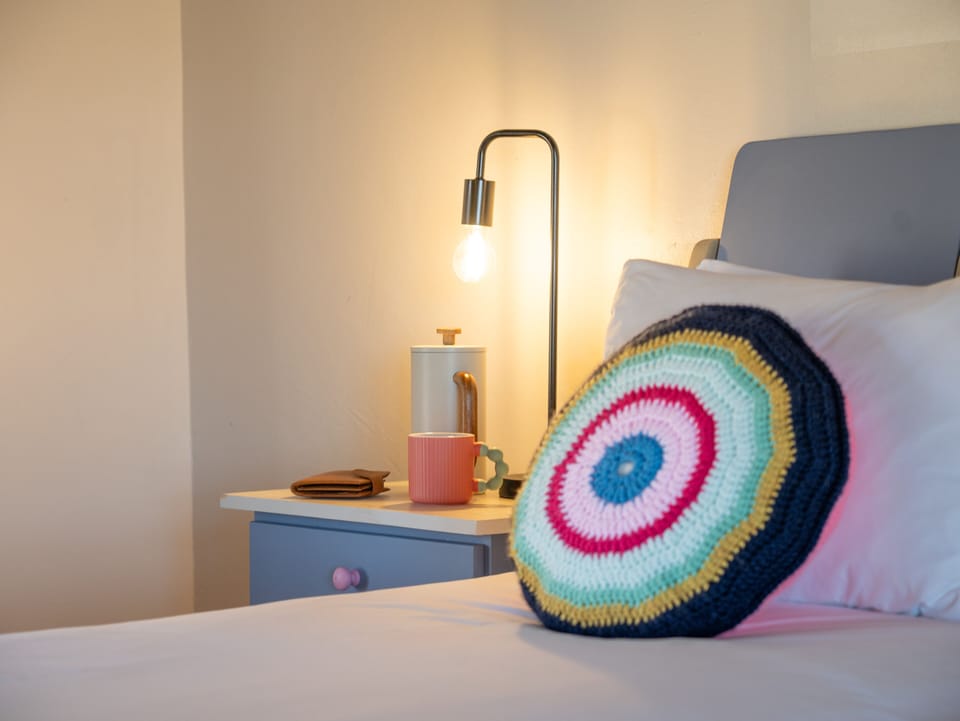 In-room safe, desk, laptop workspace, bed sheets