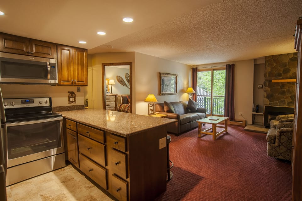 Premium Condo, Fireplace, Mountain View | Private kitchen | Fridge, microwave, oven, stovetop