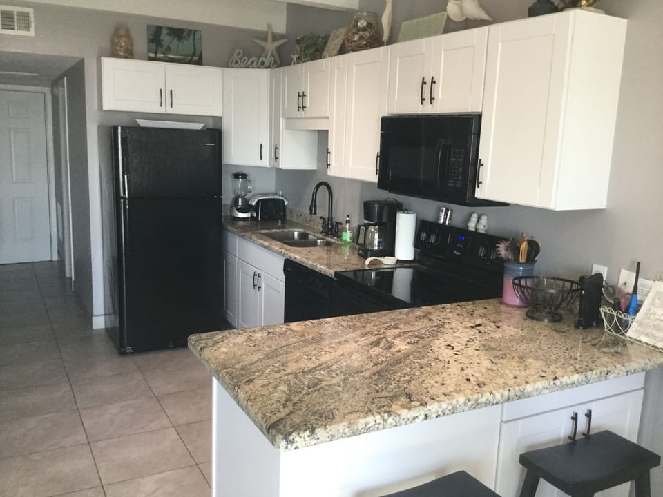KITCHEN WITH BAR SEATING