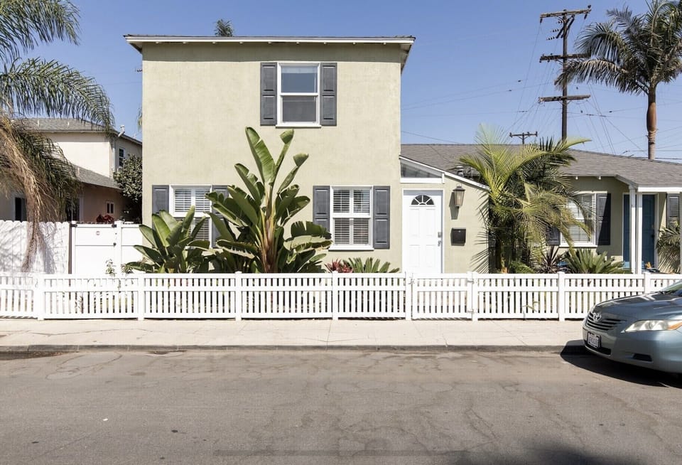 Two Story town house located on the left side of the duplex. 