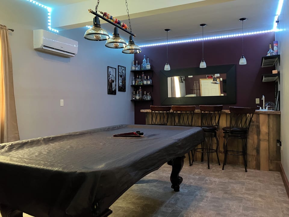 Wet bar and a 8 feet pool table
