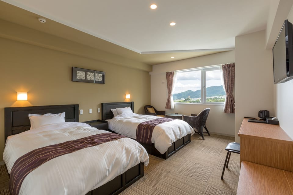 Premium bedding, memory foam beds, in-room safe, blackout drapes