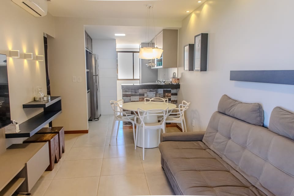 Luxury Apartment | Living area | 50-inch flat-screen TV with satellite channels, TV