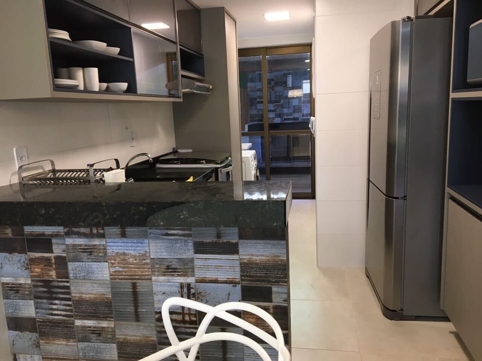 Deluxe Apartment | Private kitchen | Full-size fridge, microwave, stovetop, cookware/dishes/utensils