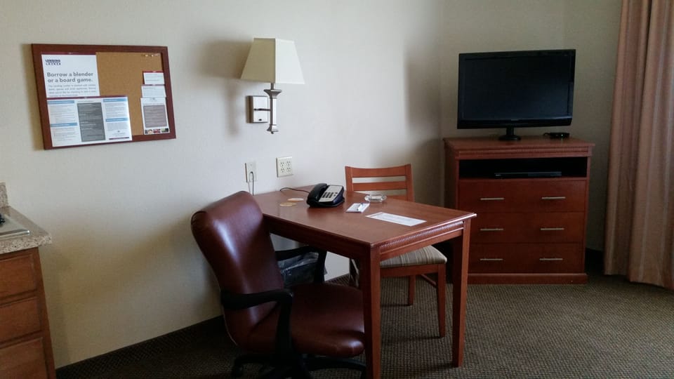 Studio Suite, 1 Queen Bed, Smoking | Living area | 40-inch flat-screen TV with cable channels, TV, DVD player