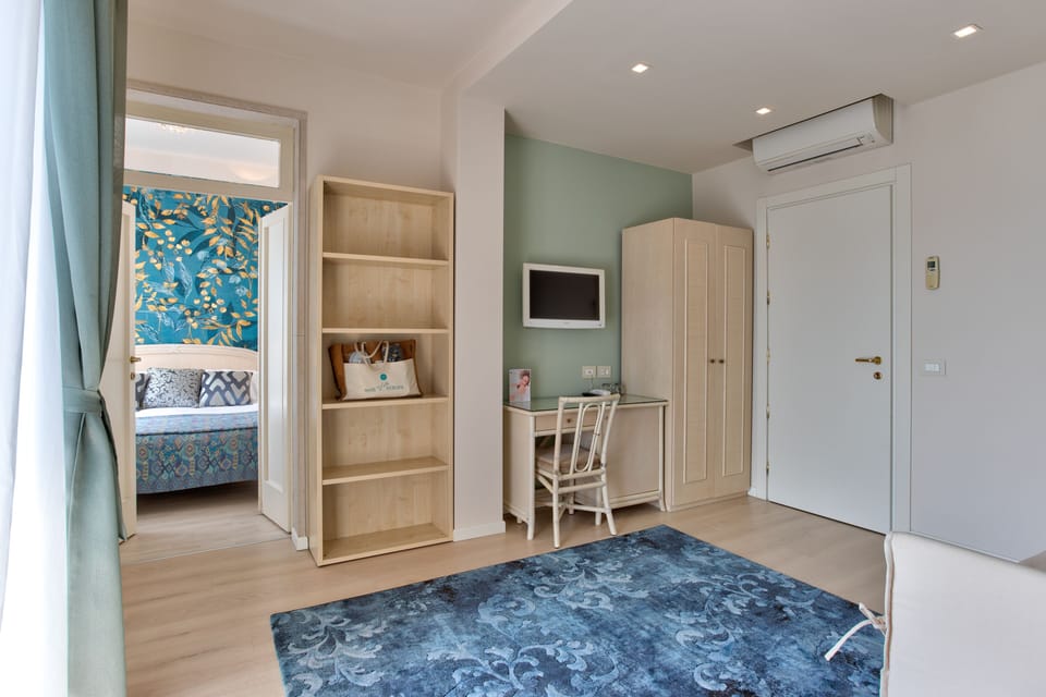 Suite, Balcony, Lake View | Premium bedding, minibar, in-room safe, desk