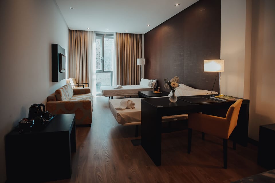 Family Room | Premium bedding, down comforters, minibar, in-room safe