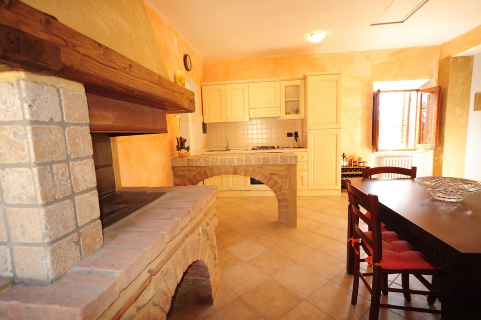 Apartment, 1 Bedroom (first floor) | Living area | Flat-screen TV