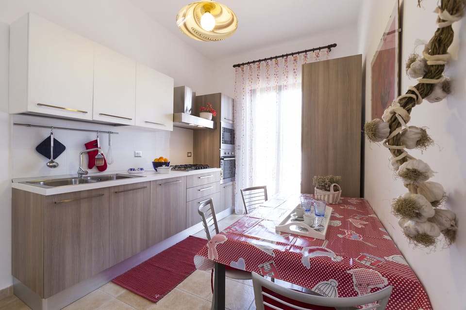Deluxe Villa, 1 Bedroom, Accessible | Private kitchen | Fridge, microwave, stovetop, cookware/dishes/utensils