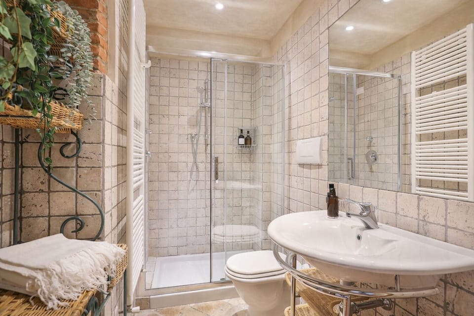 Family Suite, 2 Bedrooms, Ground Floor (Tinaia) | Bathroom | Shower, free toiletries, hair dryer, towels