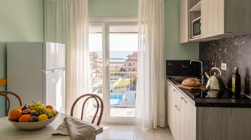 Full-size fridge, microwave, stovetop, coffee grinder