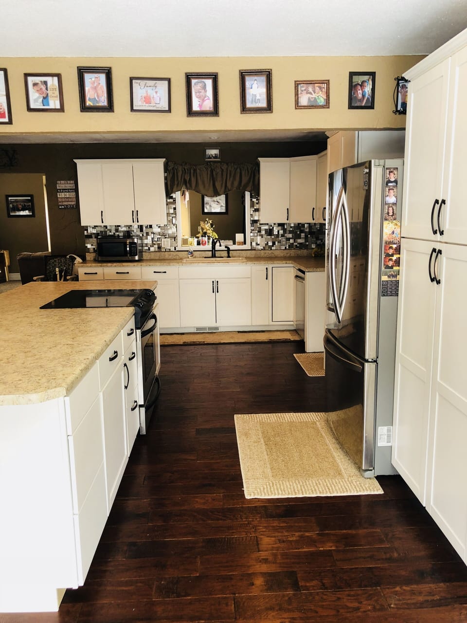 Refrigerator, flat top stove, & microwave! Condiments in fridge are available.