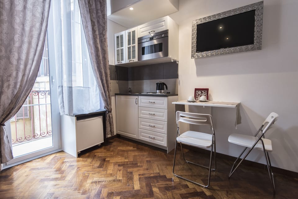 Standard Double Room (Fontana di Trevi Kitchenette) | Private kitchenette | Fridge, coffee/tea maker, electric kettle