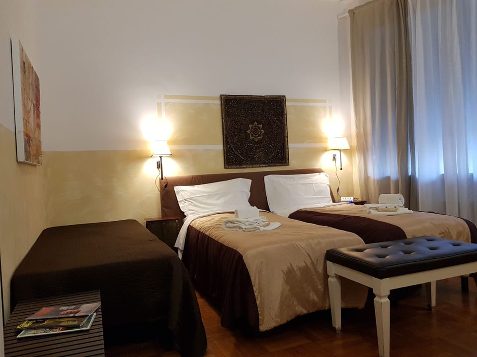 Basic Triple Room, Shared Bathroom | Free WiFi, bed sheets