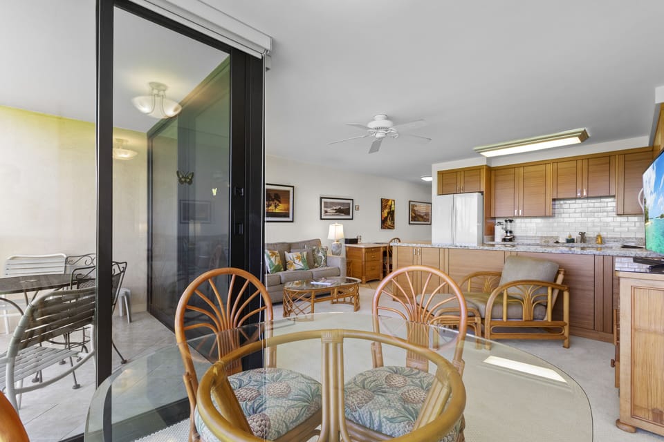 Bright, welcoming space where your morning coffee meets island breezes from your private lanai. Warm wood tones and tropical touches create a home-away-from-home feel.